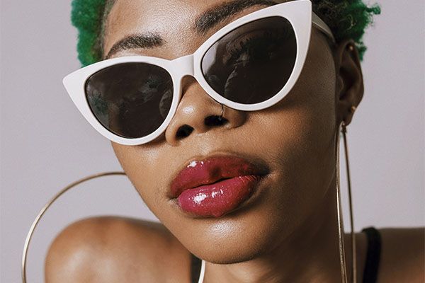 African American woman wearing sunglasses